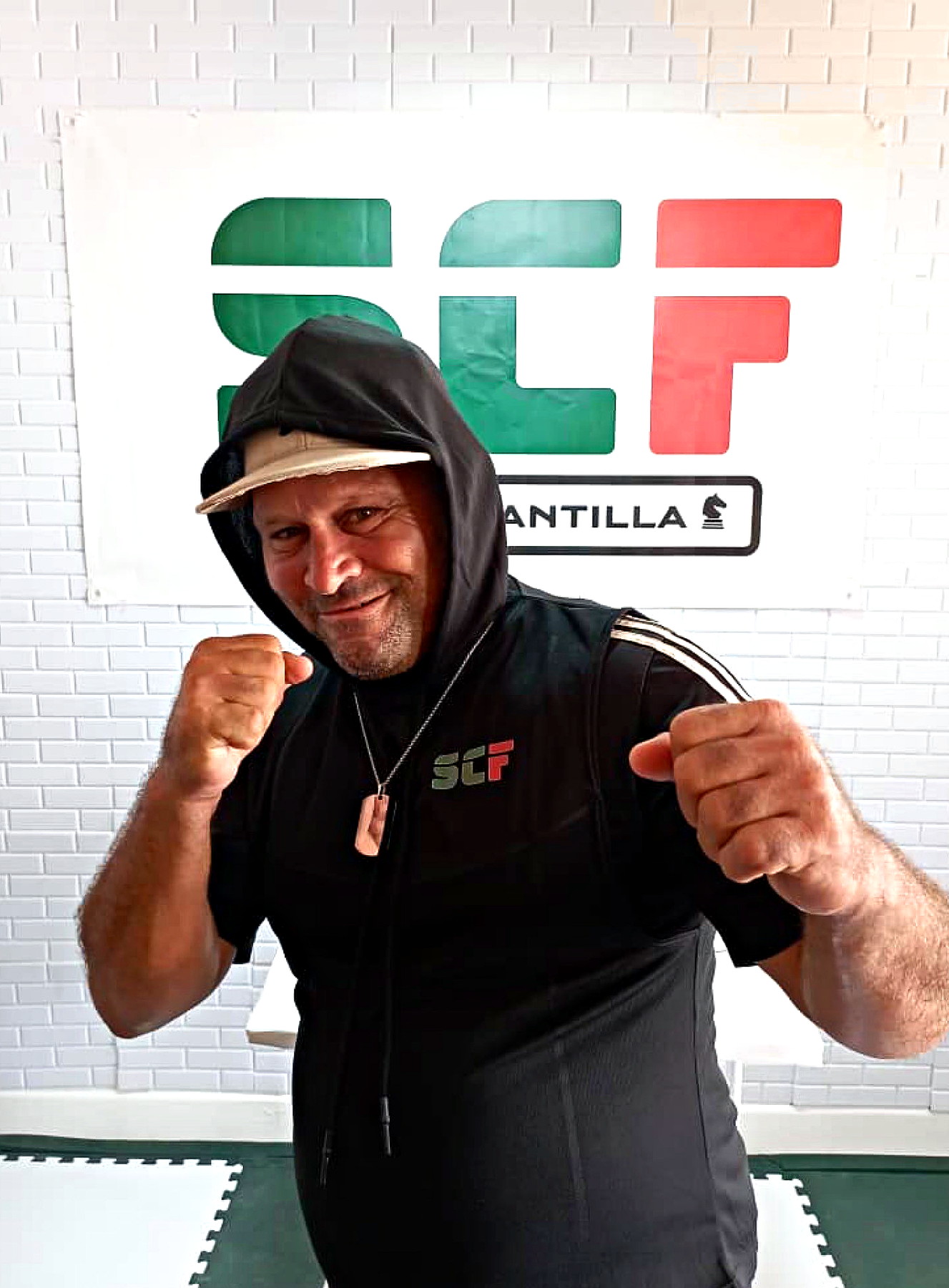 SCF fighter, black hood, fists up